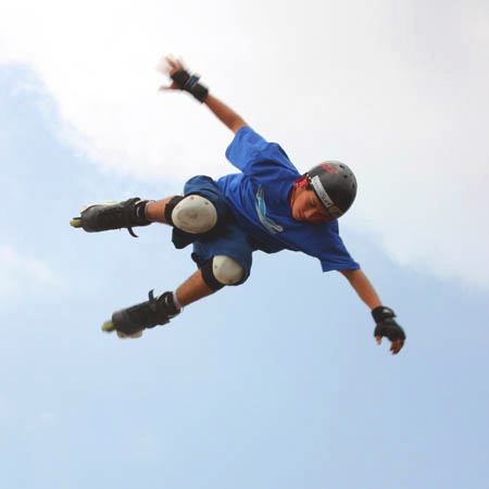 Young man showing off at Skating