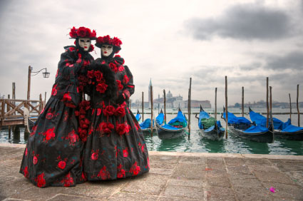 Two venetian masks in Saint Mark's, Venice, Italy.