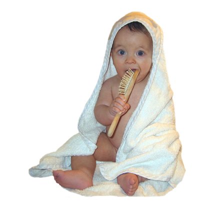 A Picture Of A Baby Posing With A Towel Around Them And A Bath Brush
