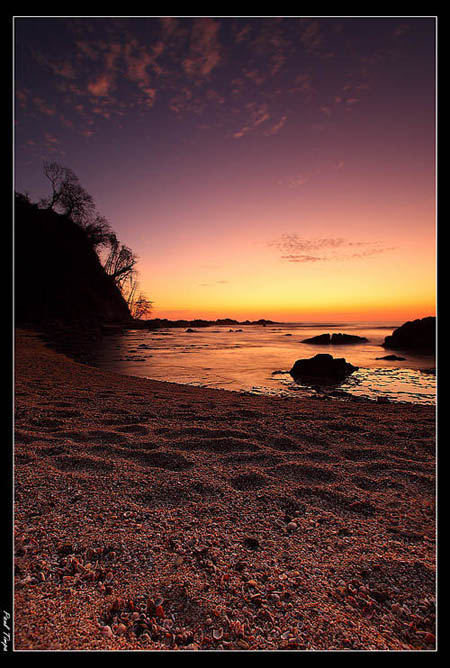 Using Manual mode to take a picture of a Sunset over a beach - By Paul Timpa